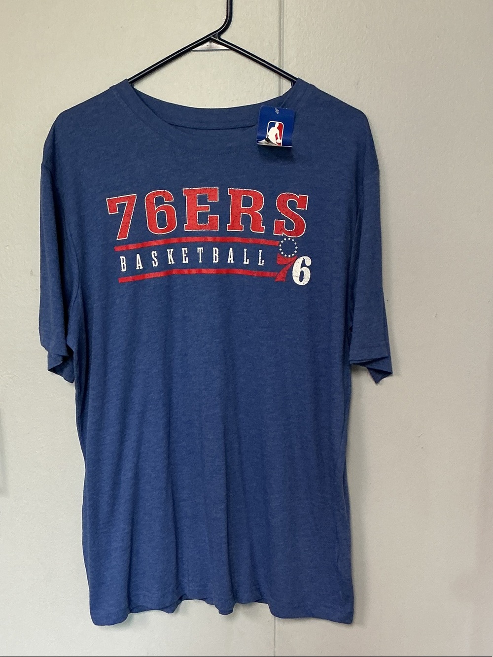 NBA Philadelphia 76ers Navy Blue Graphic Tee with Red and White Logo